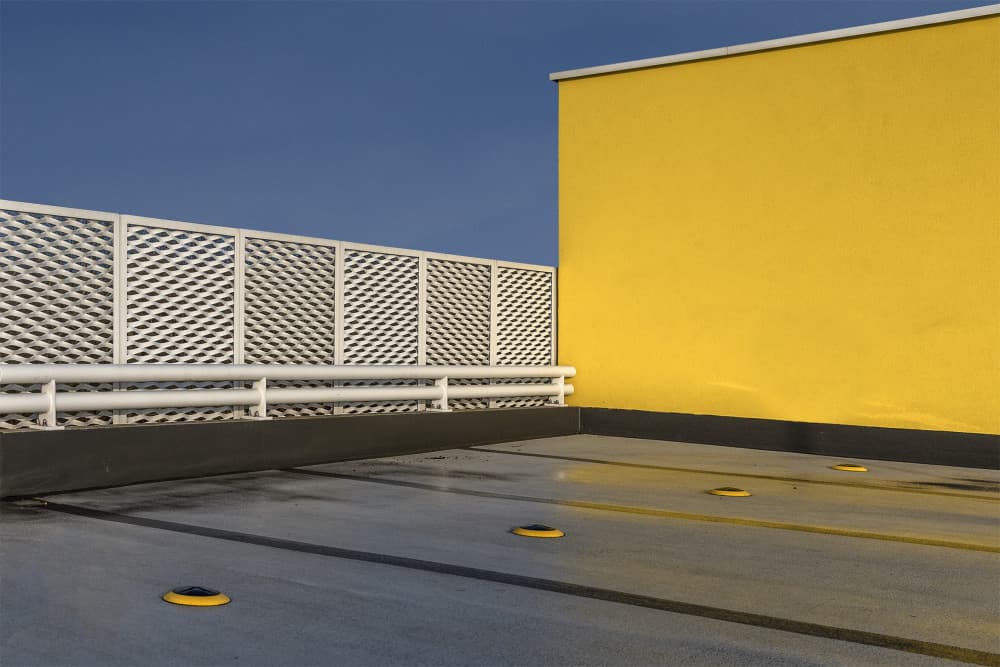 Yellow Wall Blue Sky by Jef Van den Houte — canvas wall art