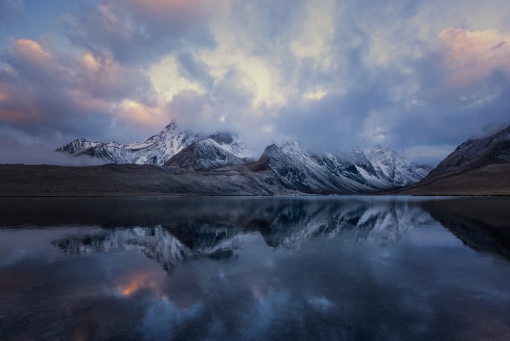Snowy Mountain Lake Reflection by Dianne Mao — canvas wall art