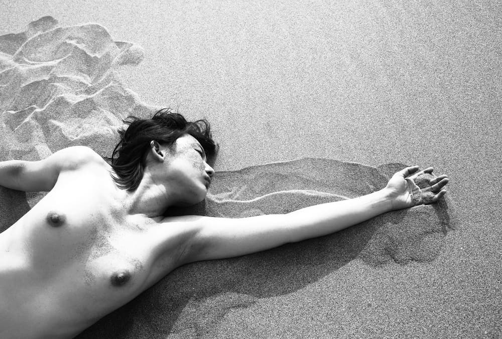 Serene Woman On Sand by Eddie Wetton — canvas wall art