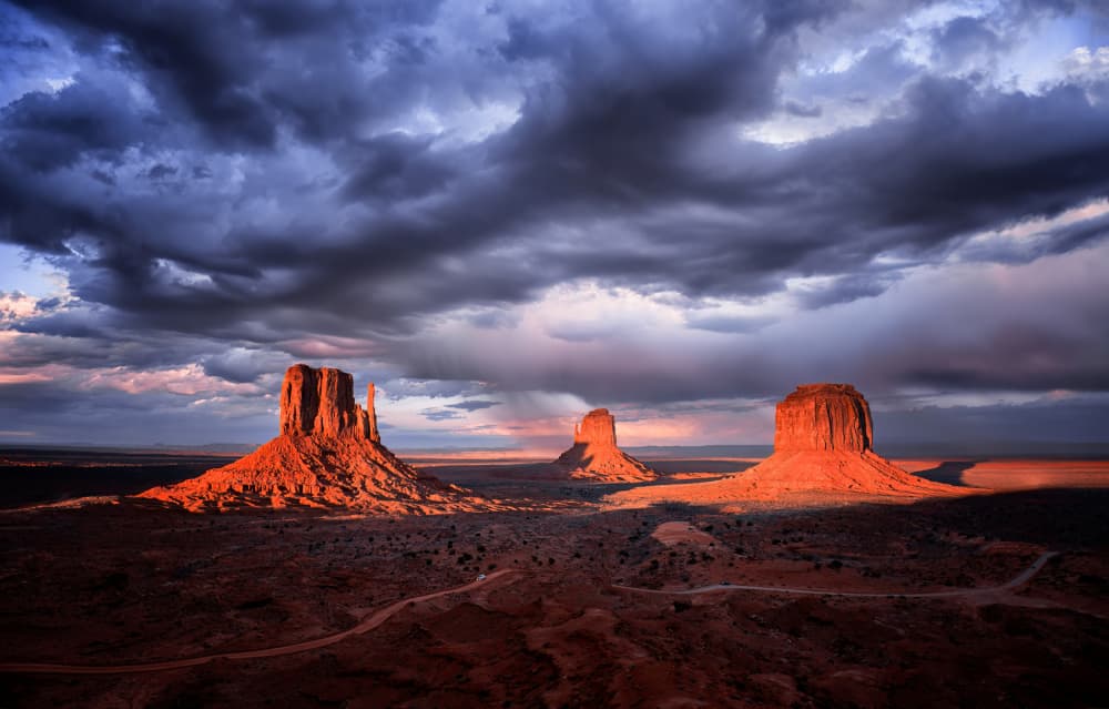 Dramatic Monument Valley Sunset by Hongyu Chen — canvas wall art