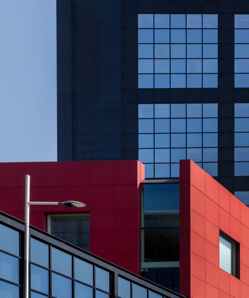 Red Blue Modern Building by Theo Luycx — canvas wall art