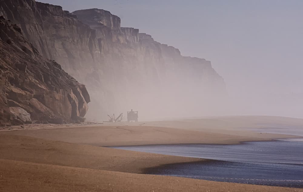 Misty Coastal Cliffs by Bego Amare — canvas wall art
