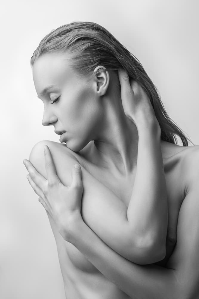Graceful Feminine Embrace by AURIMAS VALEVICIUS — canvas wall art