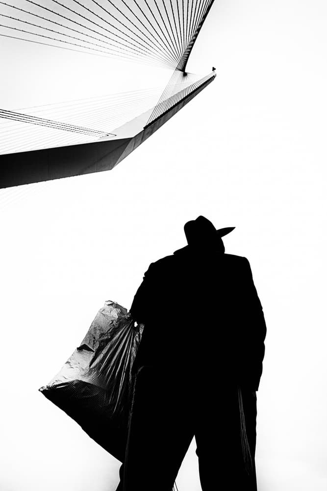 Silhouette Under Modern Bridge by Yuri Shepelev — canvas wall art