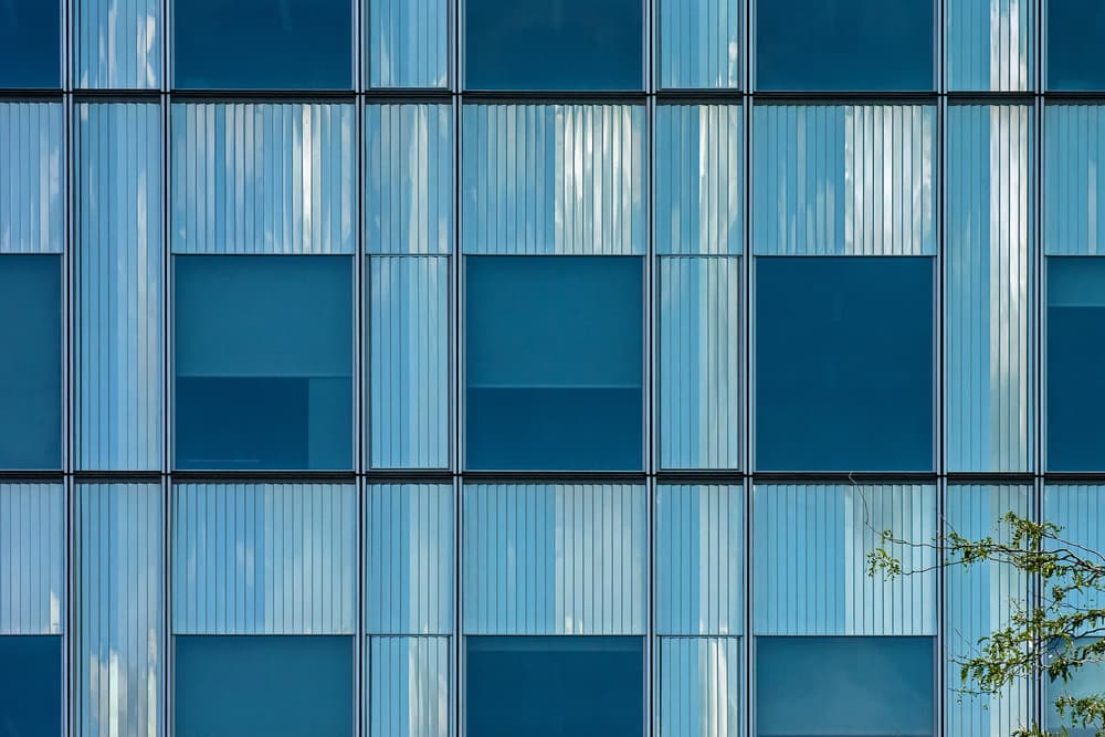Modern Blue Glass Building by Lus Joosten — canvas wall art
