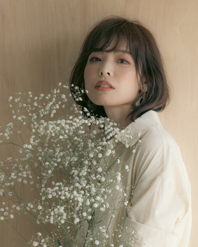 Serene Woman with Flowers by Tsutomu Sakamoto — canvas wall art
