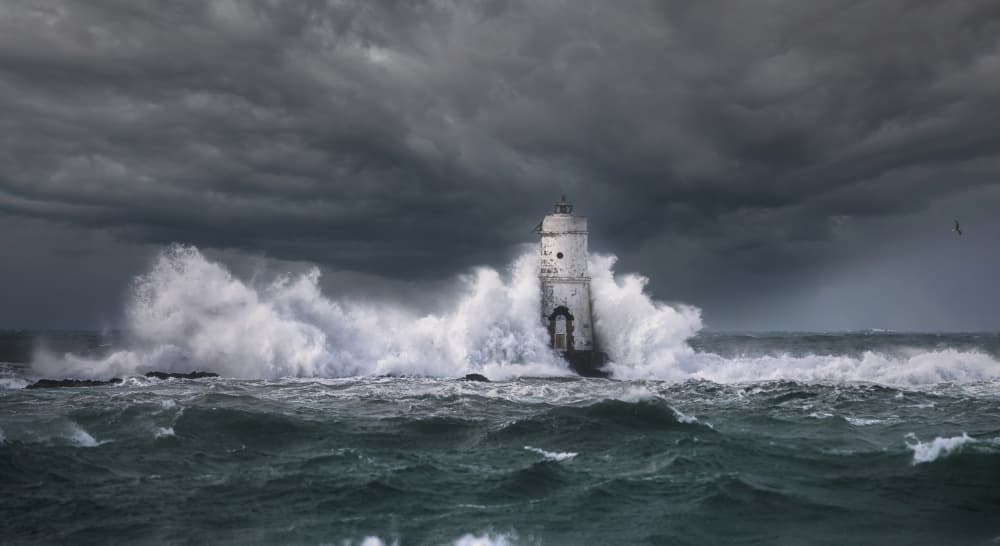 Stormy Lighthouse Waves by Daniele Atzori — canvas wall art