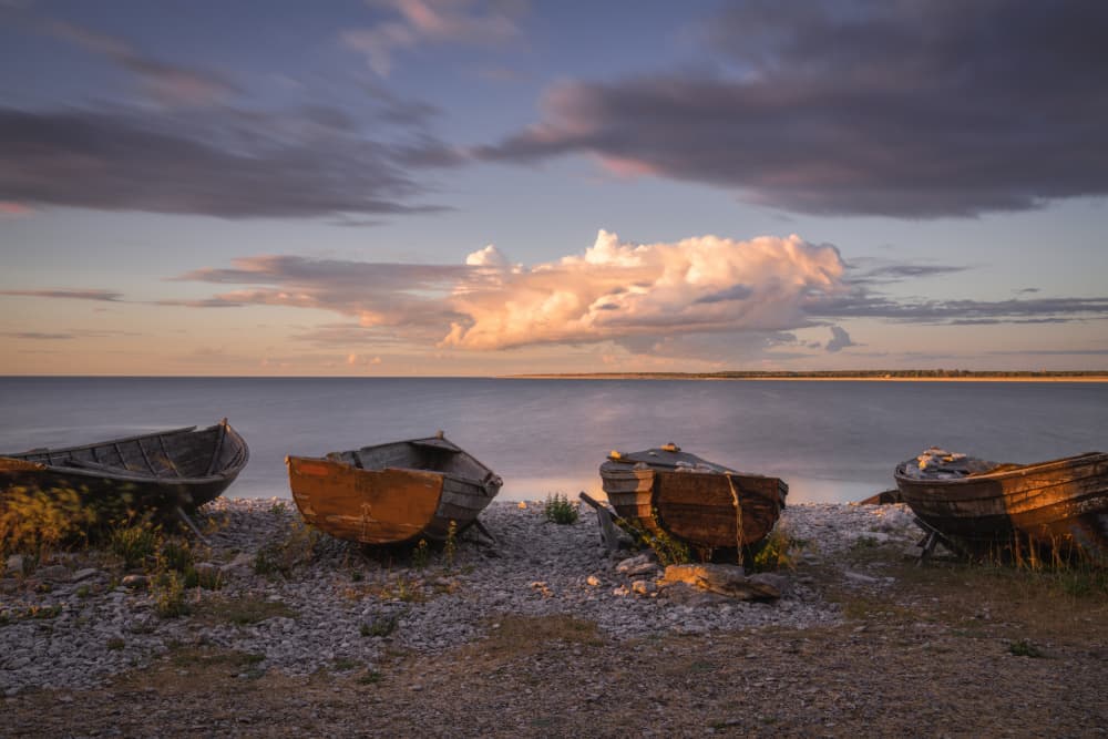 Old Boats At Sunset by Ludwig Riml — canvas wall art