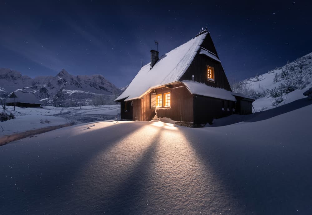 Warm Cabin Under Stars by Karol Nienartowicz — canvas wall art