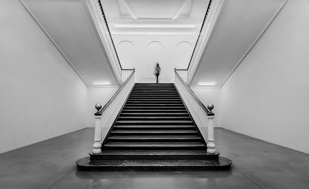 Blurred Figure Ascending Stairs by Ritxard Perez — canvas wall art