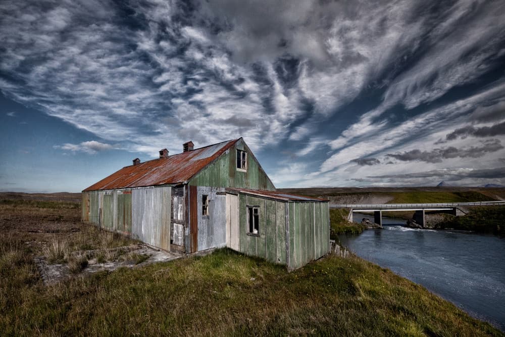 Rustic River House by Þorsteinn H. Ingibergsson — canvas wall art
