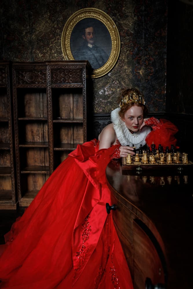 Regal Queen Playing Chess by David Bennion — canvas wall art