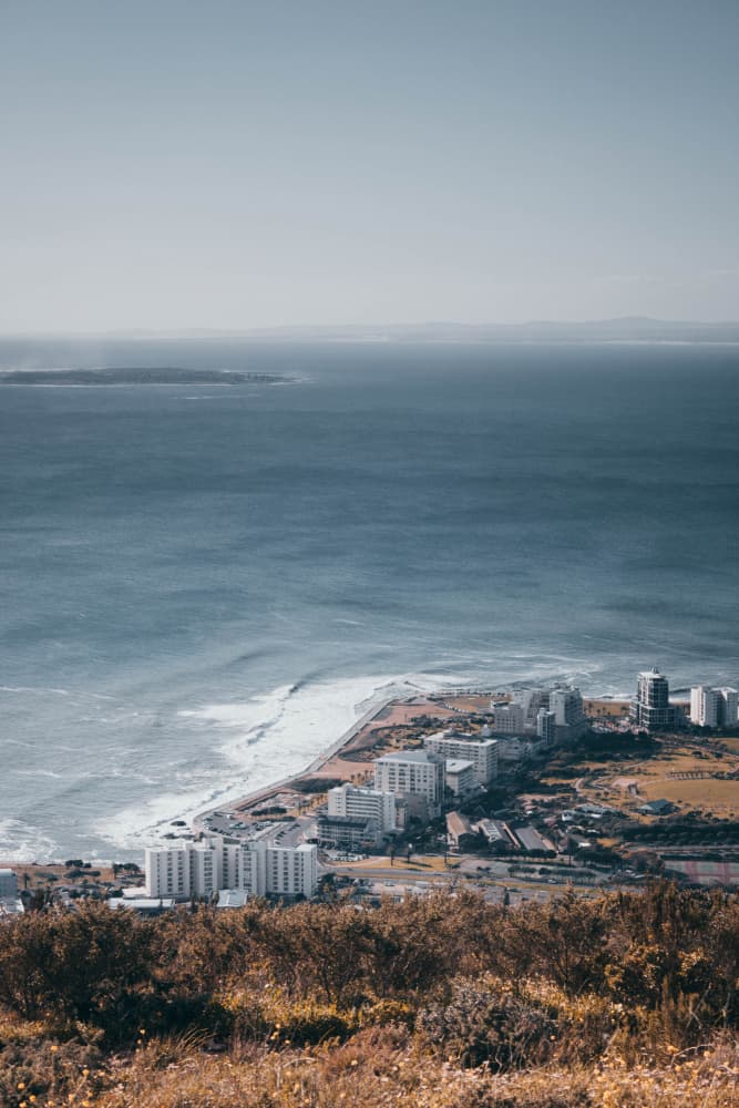 Coastal City Vista by Kauthar Isaacs — canvas wall art