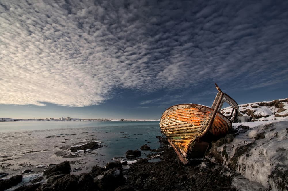 Icelandic Boat Winter Shore by Þorsteinn H. Ingibergsson — canvas wall art