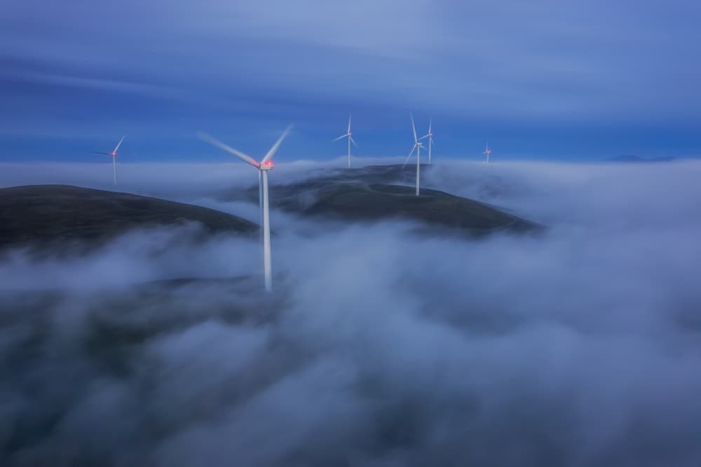Misty Wind Farm by Jenny Qiu — canvas wall art