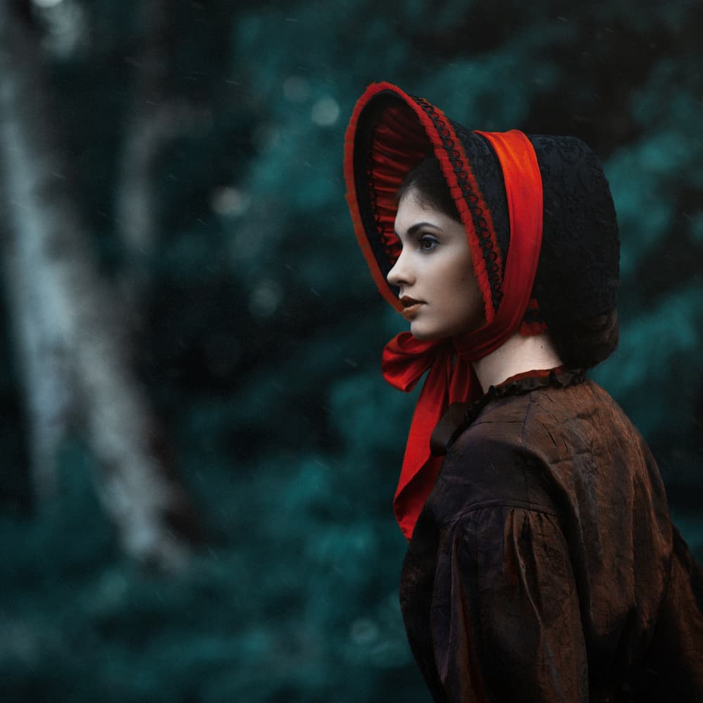 Woman in Red Bonnet by Magdalena Russocka — canvas wall art