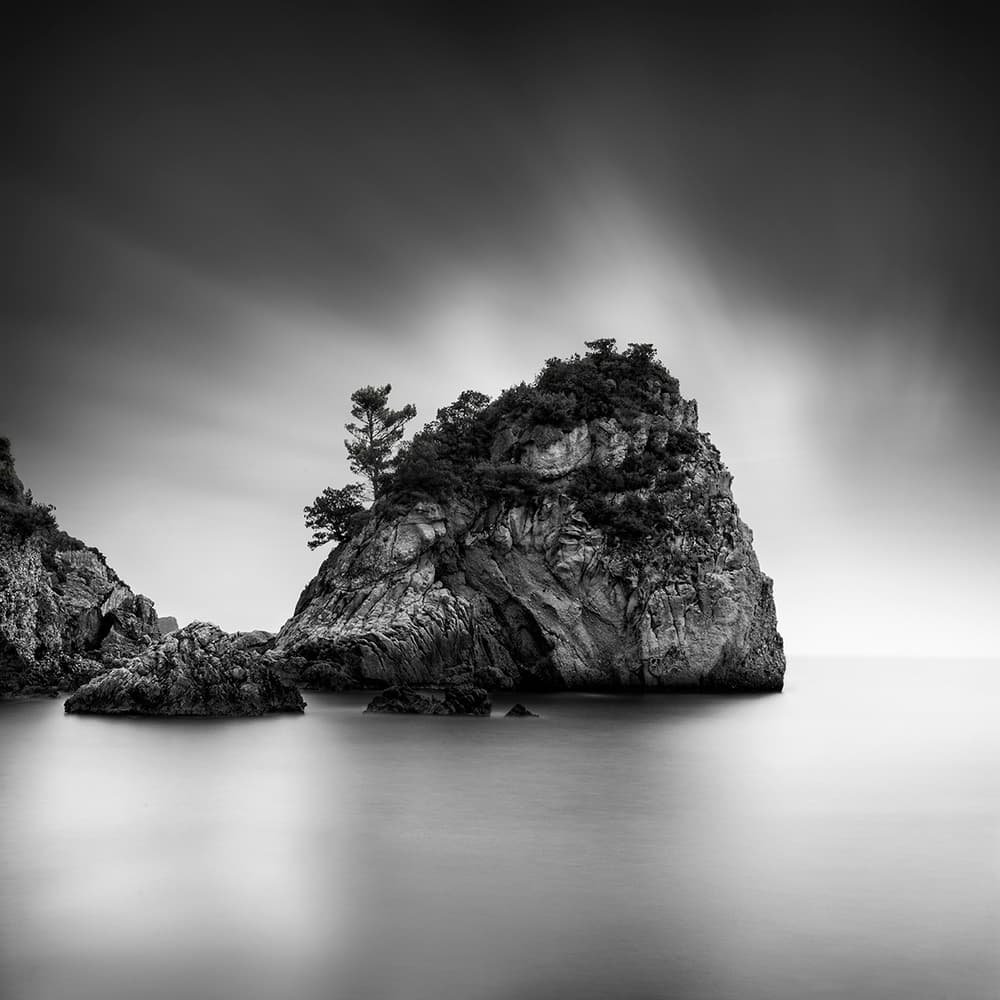 Tranquil Ocean Rock by George Digalakis — canvas wall art