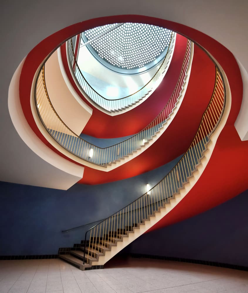 Spiraling Red Blue Staircase by Renate Reichert — canvas wall art