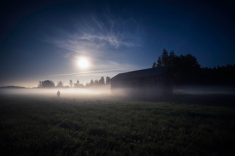 Misty Barn Under Moonlight by Mika Suutari — canvas wall art