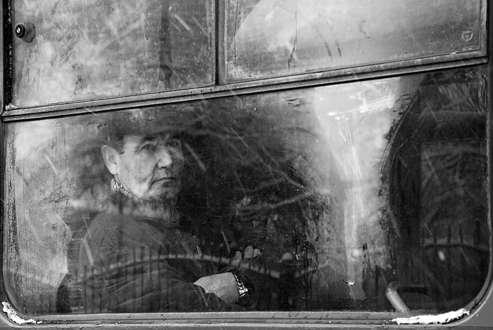 Man Through Grimy Window by Nicoleta Gabor — canvas wall art