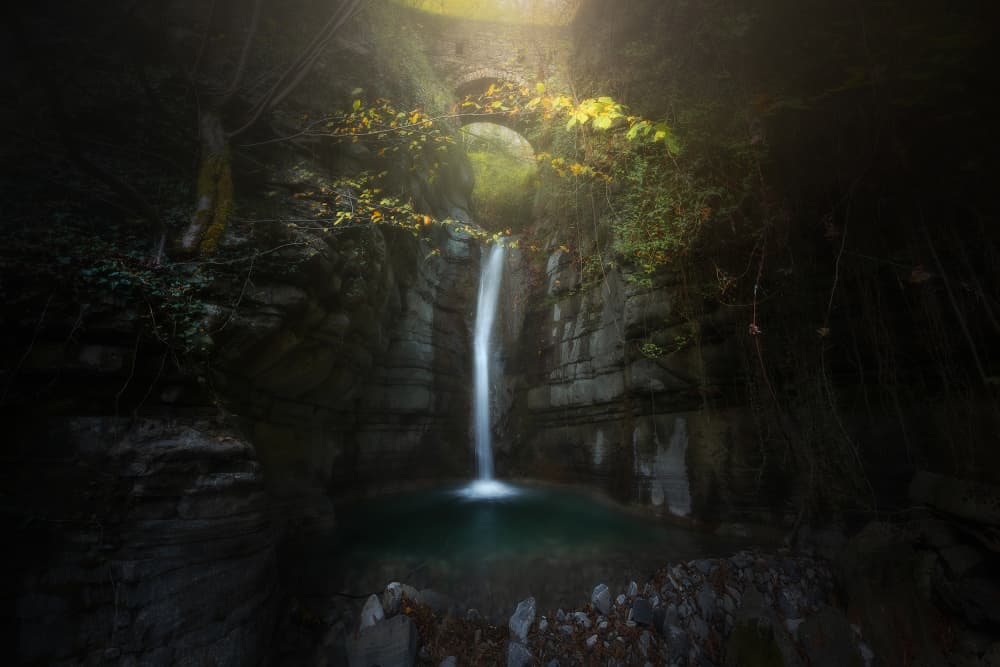 Sunlit Grotto Waterfall by Filippo Manini — canvas wall art