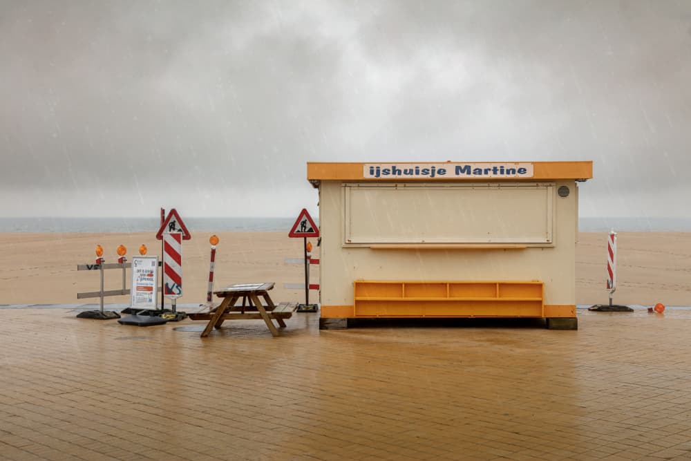 Rainy Day Beach Stand by Bruno Flour — canvas wall art