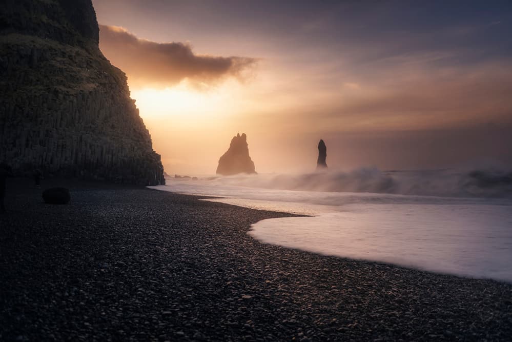 Black Sand Beach Sunset by Jorge Ruiz Dueso — canvas wall art