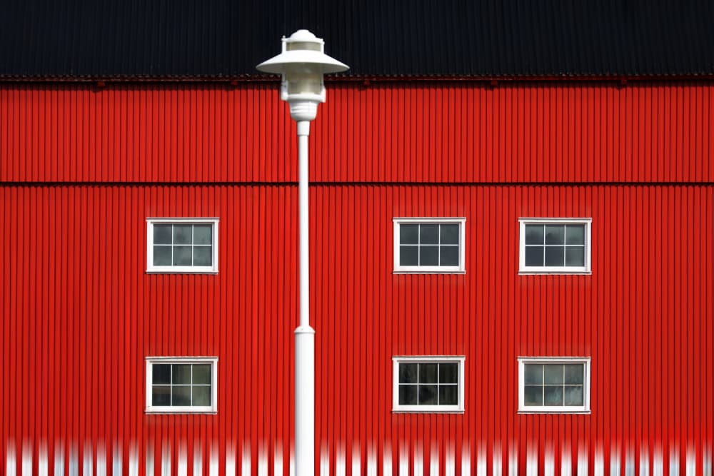 Red Building Lamp Post by Hans-Wolfgang Hawerkamp — canvas wall art