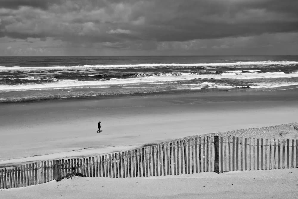 Solitary Beach Stroll by Rui Ferreira — canvas wall art
