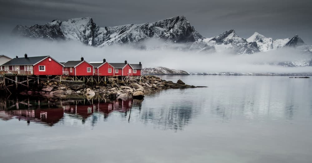 Red Cabins Misty Mountains by Lior Yaakobi — canvas wall art