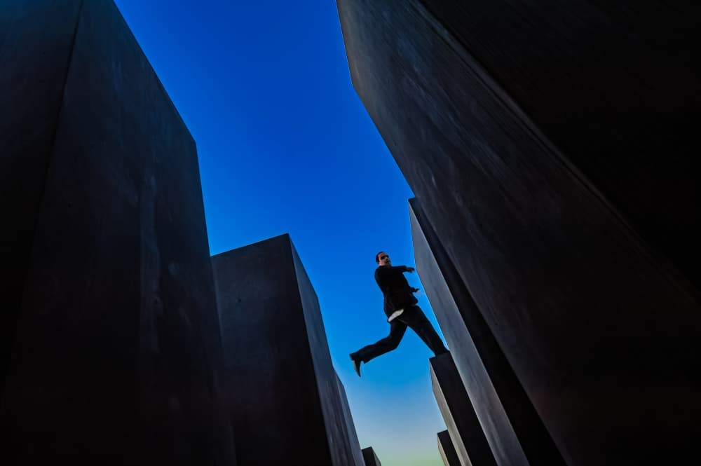 Man Leaping Concrete Blocks by Rodrigo Marin — canvas wall art