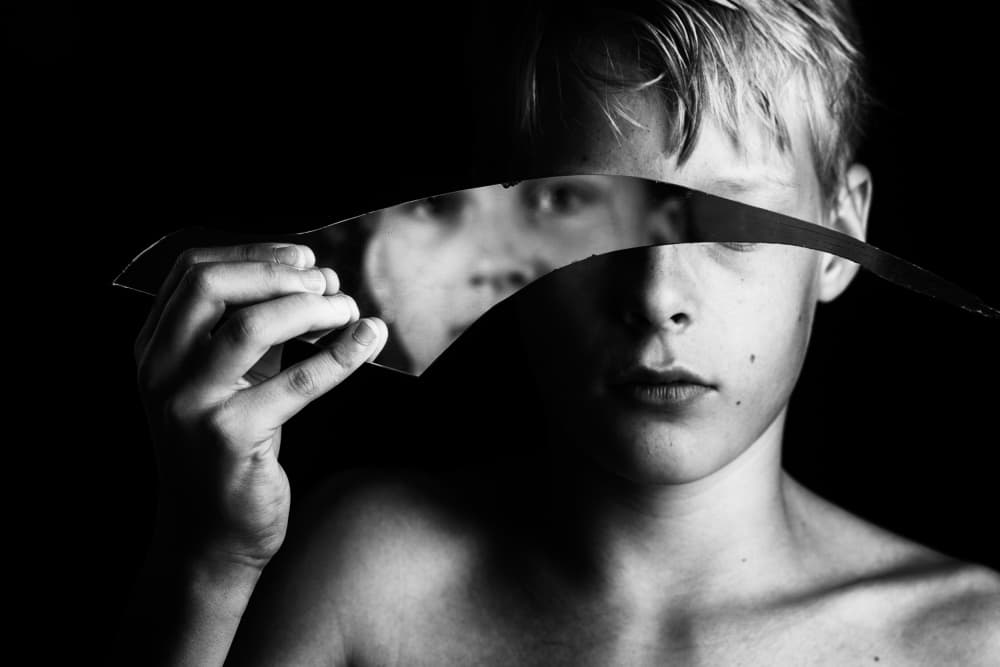 Boy With Broken Mirror by Mirjam Delrue — canvas wall art