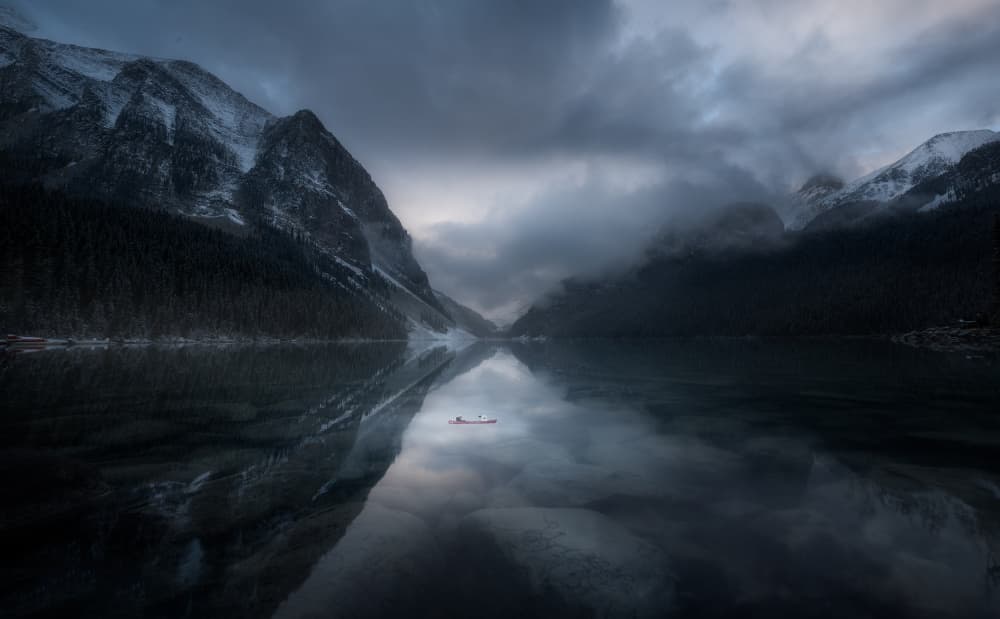 Winter Lake Canoe Reflection by Dennis Zhang — canvas wall art