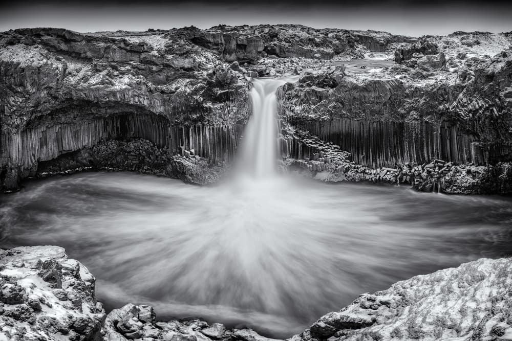 Serene Basalt Waterfall by Sunny Ding — canvas wall art