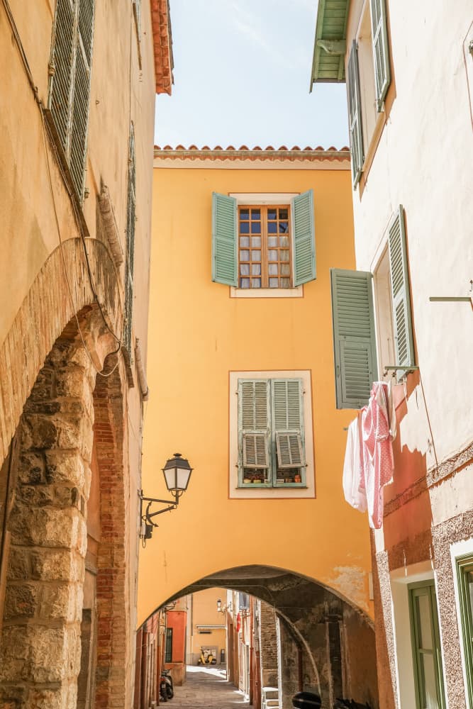 Sunny Old Town Alley by Henrike Schenk — canvas wall art