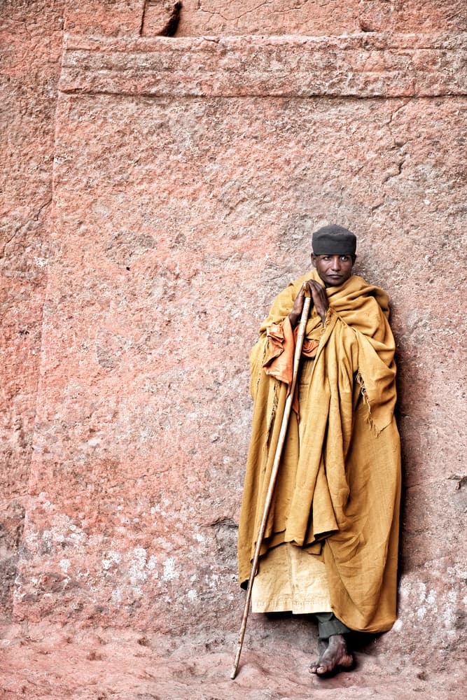 Ethiopian Monk Stone Wall by Trevor Cole — canvas wall art