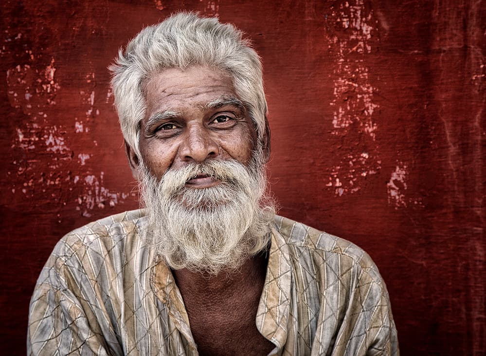 Serene Man Red Wall by Hugh Wilkinson — canvas wall art