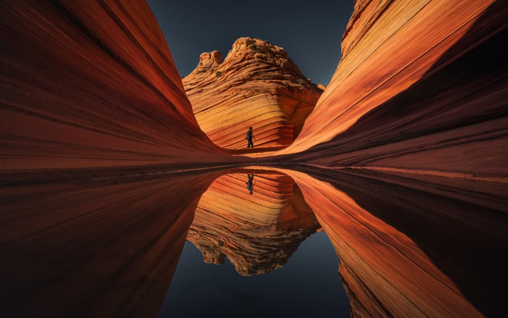 Lone Figure Canyon Reflection by Sadek Khafagy — canvas wall art
