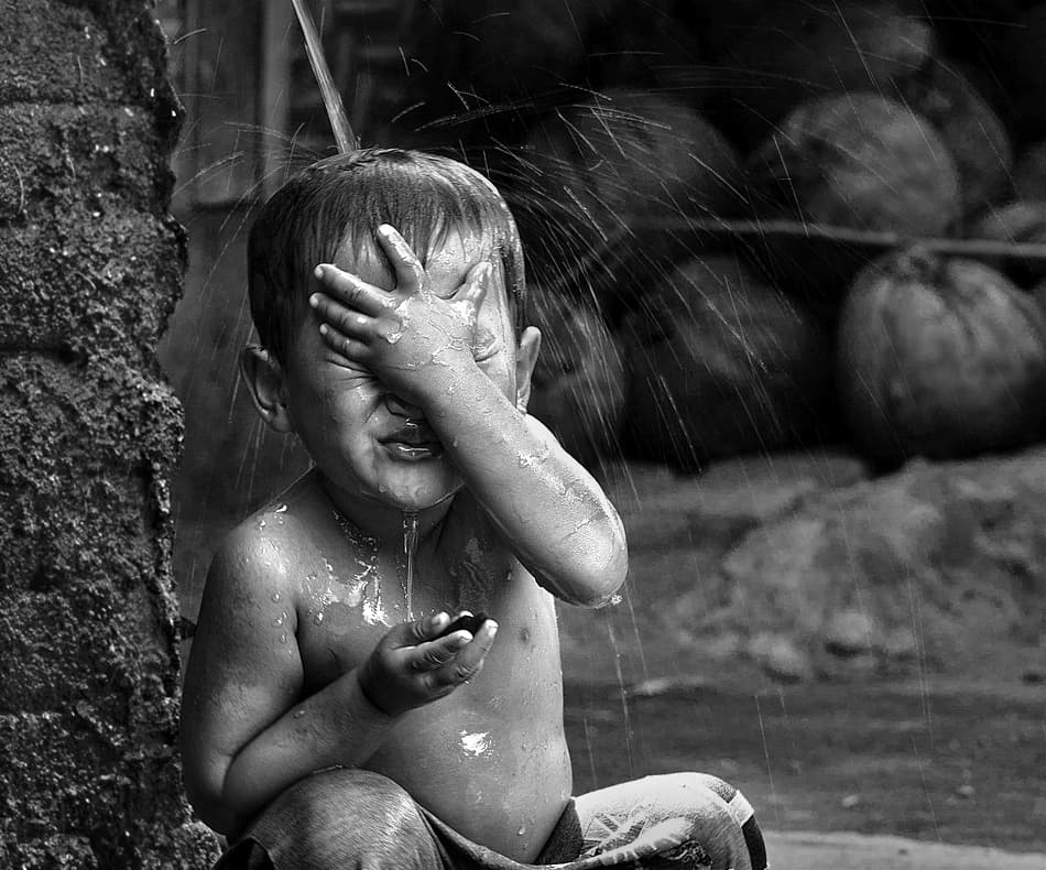 Childhood Water Play by Sebastian Kisworo — canvas wall art