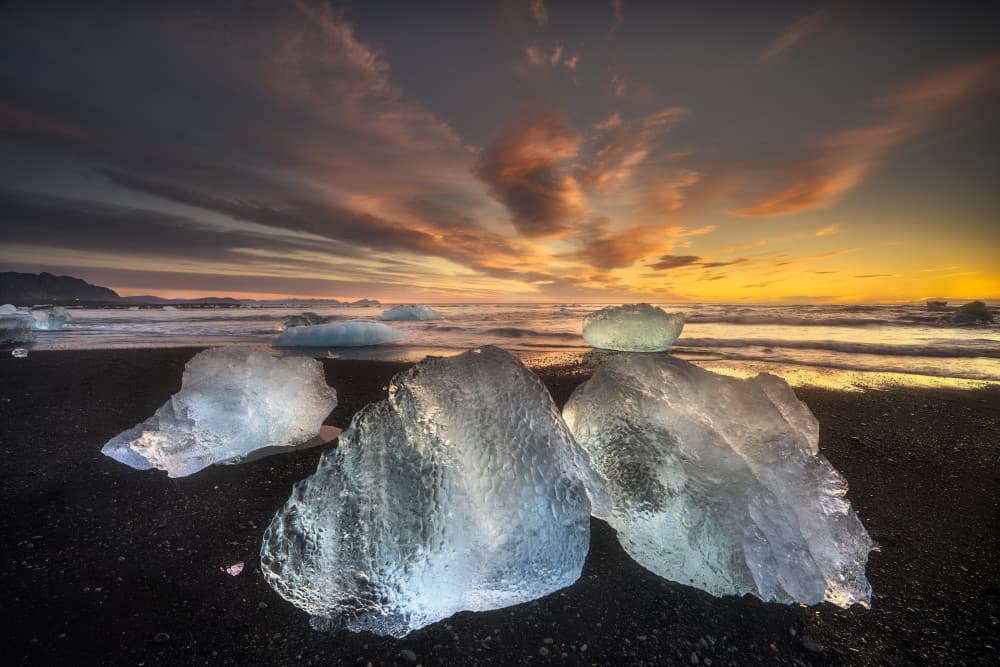 Ice Beach Sunset by Carlos Gonzalez — canvas wall art
