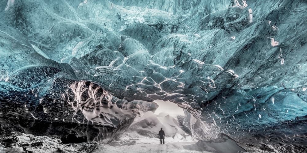 Blue Ice Cave Explorer by Lior Yaakobi — canvas wall art
