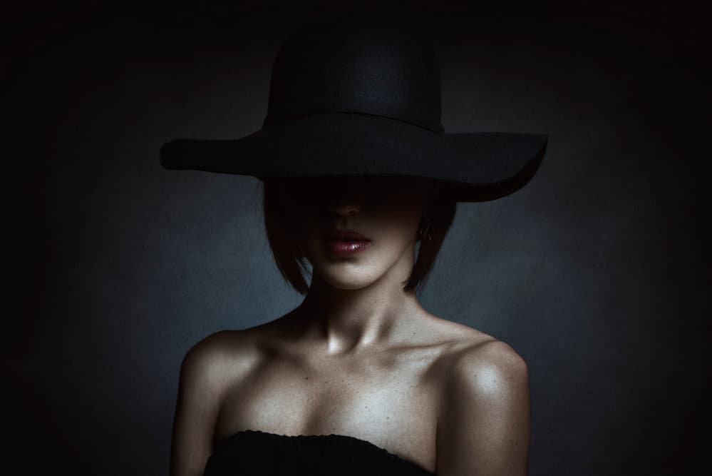 Mysterious Woman In Hat by Denis — canvas wall art