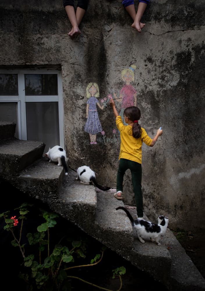 Girl Drawing with Cats by Ali Can — canvas wall art