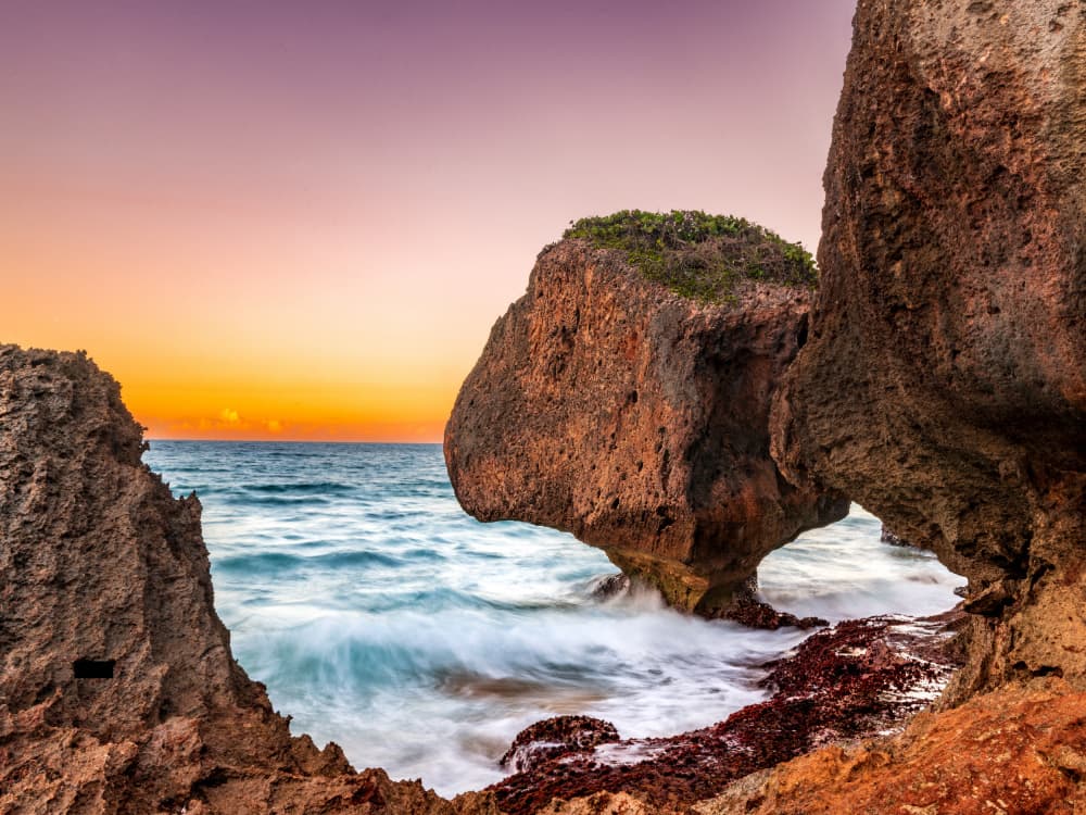 Rocky Coast Sunset Glow by Ariel Ling — canvas wall art