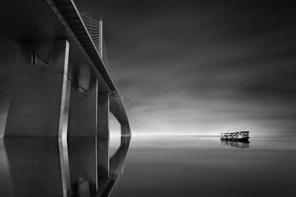 Bridge and Lone Boat by boonlertro — canvas wall art