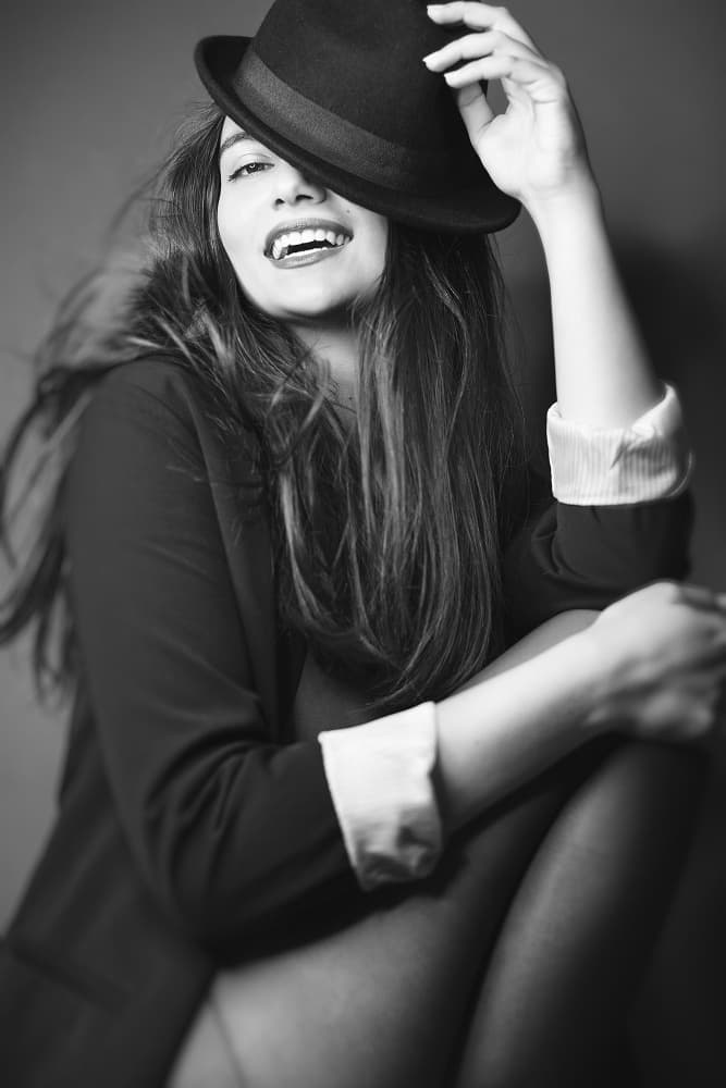 Playful Woman Hat by Oren Hayman — canvas wall art