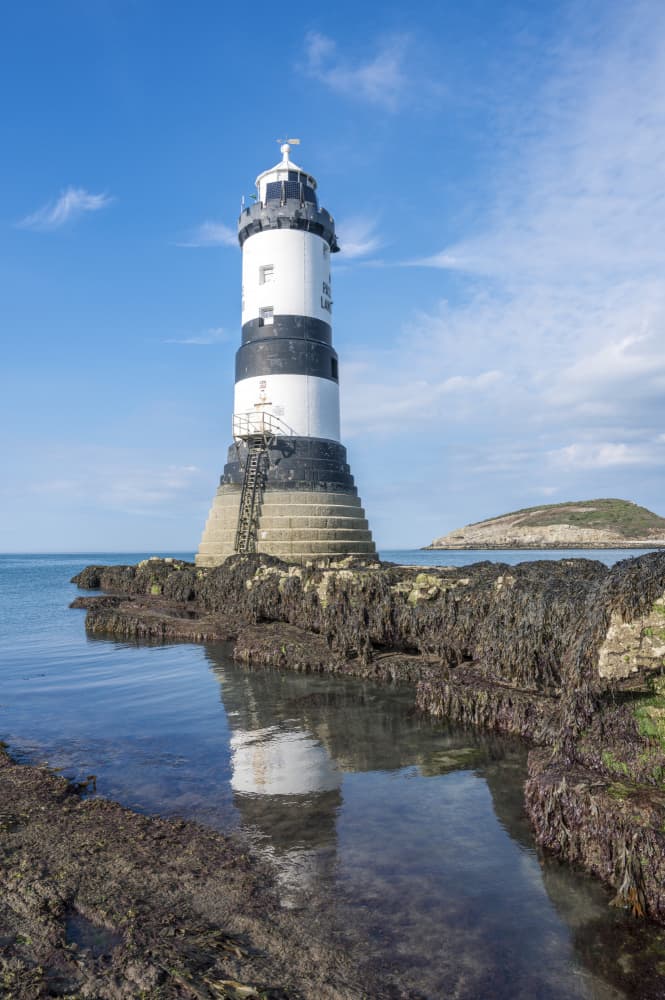 Striped Lighthouse Coast by Christa Stroo — canvas wall art