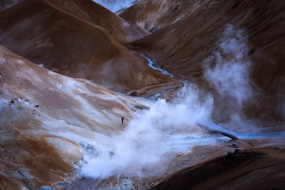 Lone Hiker Geothermal Valley by Dennis Zhang — canvas wall art