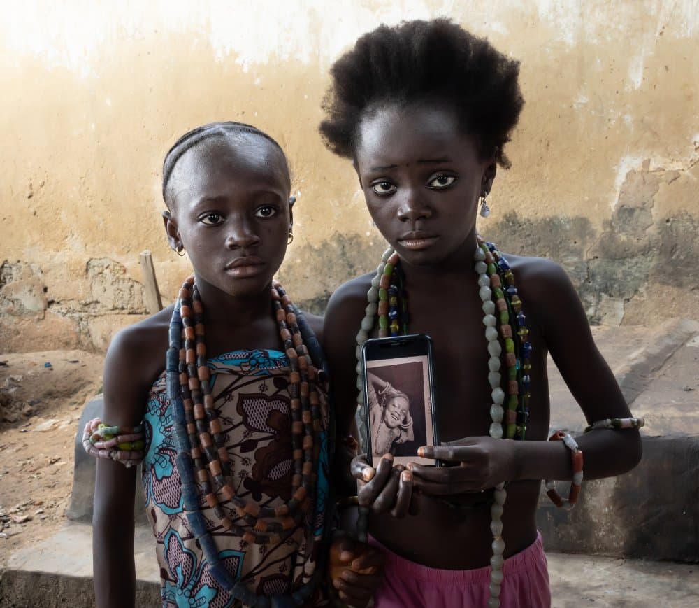 African Girls with Phone by Elena Molina — canvas wall art