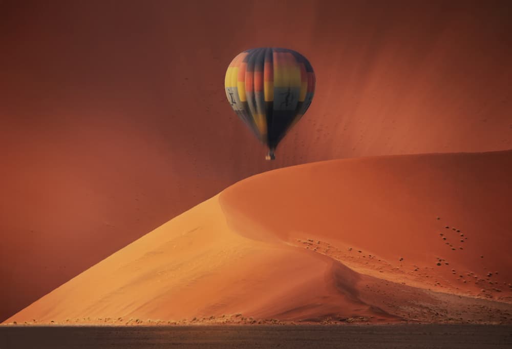 Desert Balloon Adventure by Hans-Wolfgang Hawerkamp — canvas wall art